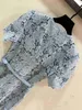 Designer dress fashionable 2024 blue hollowed out lace waist cinching dress womens high-end round neck short sleeved short skirt