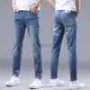 Designer di jeans maschile europeo jeans di fascia alta elastica elastica slim fit piccoli piedi dritti di moda lavati i pantaloni di jeans da uomo