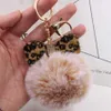 Tornari Cancioli di portata Rhinestone Pom Tornario Fluffy Fux Furx Pompoms Keyring for Girls Women Bags Borse Craft Craft Craft