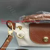 Sac à dégagement élevé en gros en cuir Cognac Store Quality Small Freight Source Sac à main Sacs à manche unique Femme Portefeuille Mini Dumpling Designer Handsbags White 31x7