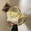 Bola de grife novo Longxiang Bag Leisure Comutando a Frenda Internet Celebridade moda de saída simples e ocidental estilo versátil um ombro crossbody