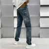 Heren jeans ontwerper herfst/winter nieuwe jeans modemerk kleine rechte been slanke fit elastische washigh -end licht luxe herenverdiking