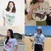 Designer coréen d'été Kim Tak Yin même petite marguerite fleur de saucisse imprimée t-shirt