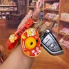 Keychains Lanyards New Oil Floating Cartoon Wind Chimes Quicksand Bow Keychain Personality Trendy Bags Pendant Automobile Hanging Ornament