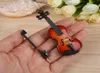 Hochwertige neue Mini -Geigenversion mit Stütze mit Unterstützung Miniatur Holz Musikinstrumente Kollektion Dekorative Ornamente Mo2817720