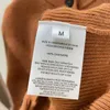 Frauenwesten Frühes Herbstprodukt Rückenhals Kette dekoriert runde Taschenkaschmirweste für Frauen