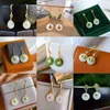 Brincos Dangle Designer Série original Classic Natural Hetian Jade Simple Rodada Rodada Chinesa Charm Ladies Silver Jóias