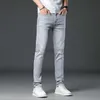 Designer de jeans masculin concepteur d'été mince luminaire de couleur tendance à la mode pour un pantalon masculin élastique élastique slim élastique lavé et blanc européen blanc européen