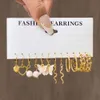 Alloy Love Pearl Snake Butterfly Mushroom Lock Ear Buckle Creative Personalized Card Earrings 12 Piece Batch