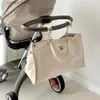 Windelbeutel Ins Cute Bear Stickerei Baby Wickelbeutel Organizer Mutterschaftstasche für Kinderwagen Mama Bag Handtasche Fahrt großer Ausflugsbag L410