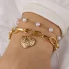 Chaîne de mode personnalisée Love Pearl Double couche Femme Commuter Peach Heart Pendant Bracelet Hand Alloy Jewelry