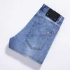 Designer de jeans masculin léger qualité luxe de luxe printemps / été jeans masculin slim fit haut de gamme élastique pantalon de jambe droite bleu entièrement KK7363