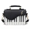 Tas 2024 Koreaanse piano design damesschouder pu lederen messenger handtas mode strakke make -up pocket munt portemonnee