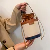 Bolsos de hombro para mujer Cilindro PU Cuero cubo de cuero Damas Bolsas de cuerpo cruzado Bolsos de dibujo informales para compras de viajes de verano 240415