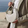 2024 Omuz Çantaları Numero Dix Luxurys Omuz Kadın Tasarımcı Yarım Ay Tote Crossbody Bag Moda Paris Çanta Baget Zip Hobo Çanta Düz Balf Deri