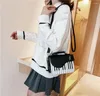 Tas 2024 Koreaanse piano design damesschouder pu lederen messenger handtas mode strakke make -up pocket munt portemonnee