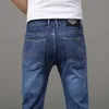 Designer en jeans masculin grand frein nouveau jean jeans masculin marque en métal décoration slim slim small pieds pantalon long élastique décontracté