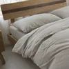 Sängkläder uppsättningar 3,2 kg fyra-stycken omslagsark Bäddkuddfodral Vanlig bomull tvättad 4st Set Simple Student Use Home Textile