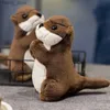 Peluche poupées kawaii otter plalushie la loutre toys en peluche baby animal poupée coussin de Noël anniversaire de fête de fête de fête de fête de cadeau y240415