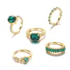 Anello di strass verde creativo con intarsio geometrico e 5 anelli set