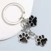 Tornari percorsi simpatici smalto gatto cane zampa Keechain kawaii animale footprint catene chiave per donne uomini accessori accessori per le gioielli fai -da -te regali souvenir