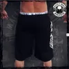 Shorts casual maschi estivi cargo semplice lettera a bordo solido marchio maschio fitness abbigliamento da bodybuilding homme 240410