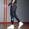 Zomer dunne ijs zijden casual broek, snelle drogende broek voor heren, gestreepte letterafdruk, zwarte sport elastische leggings, lange broek