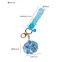 Keychains lanyards Creative Acryl Liquid Oil Starfish Söt flytande nyckelringstrand varelse Skal Keyring Women Bag Pendant Trinket Aquarium Gift