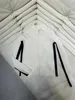 Женские трикотажные трикотаж дизайнер 24 Ранняя весна Новая Наньо Ча маленький ароматный стиль Универсальный черно -белый контрастный поло.