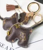 Manufturer Direct Supply Key Chain Creative Small Cessories Pendants Pendants Cartoon Camikered Dog PU Leather Key Chain3239404