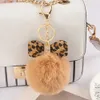 Keychains Lanyards Fashion Pompom Keychain Creative PU Bow Keyring With Brilliant Rhinestones Women Handbag Ornaments bil nyckelhållare tillbehör