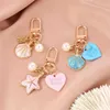 Llaves de llaves lindo llavero estrella estrella llave de corazón elegante para mujeres adornos colgantes de auriculares accesorios de regalo de joyería