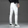 Designer de concepteur de jeans masculin pour hommes en jean petit pieds slim coton Nouveau jean d'été Brand Jeans Black and White Pantalon