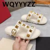 Slippers Rivet Decro lã plana redonda de dedos de moda de moda Casual Casual Leather Ladies Dress Slides Sandals de inverno 2024