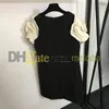 パーティードレスファッションコントラストカラードレスデザイナーフラワーショートリーブスカート女性ラウンドネックブラックスリムドレス