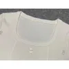 女性用Tシャツデザイナー2024ニット夏の新しい高品質の小さなフレグランスレターUネックショートスリーブプルオーバールーズ汎用性の高いトップ9ixo