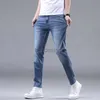 Designer di jeans maschile europeo jeans di fascia alta elastica elastica slim fit piccoli piedi dritti di moda lavati i pantaloni di jeans da uomo