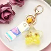 Anahtarlıklar Landards Creative Kore Versiyonunun Quicksand Sequins Yağ Denizyıldızı Kabuğu Akrilik Keychain Sihirli Renk Lazer Deri Halat Çanta Kolye