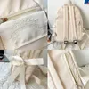 Skolväskor Kvinnor Bow White Ryggsäckar Fashion Bag For Teenage Girls Canvas Book Bagpack 2024 High School Nylon Letter Backapck