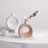 Vasen nordische Keramik Vase kreisförmige hohle Donuts Blumentopf Haus Wohnzimmer Dekoration Zubehör Büro gefrorener Desktop -Dekor Geschenk