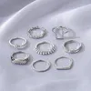 Viento nuevo aleación cross 8 set personalizado perla e índice anillo de cola de la unión del dedo