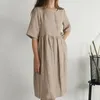 Robes décontractées Femmes Vintage Robe d'été Half manche rond Round Neck Bouton élégant Linette en vrac en vrac Robe Femme