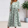 Robes de fête Soft Touch Femmes Habille à imprimé floral A-Line Midi avec des poches latérales pour les vacances d'été Portez le cou rond Sleeve courte