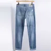 Designer di jeans maschile europeo jeans di fascia alta elastica elastica slim fit piccoli piedi dritti di moda lavati i pantaloni di jeans da uomo