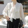 Camicette da donna Qoerlin blusa blusa Donne arruffale di molla di moda coreana top a maniche lunghe a manica lunga camicie beige s-xl