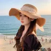 Berets بالجملة Panama Crochet Summer كبيرة مرنة هاواي الملونة فيدورا سيدات شمس للنساء الحرير القوس شاطئ قبعة القش قش القش