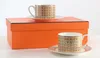 Designerkoppar och fat Ställ Bone China Coffee Cup Saucer Set Luxury Afternoon Tea Cup med presentförpackningsdryck Mugg