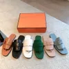 Women's Leather Flip Flops tofflor mule kalv äkta läder yttersula fritid och bekväma strandsandaler lyxdesigner platt tofflor 35-41 med låda