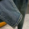 Metalliska broderier jeans designer casual byxor tvättade denim byxor män kvinnor förlorar jogging byxor mens jeans