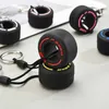 Keychains Lanyards Luxury Mini F1 Racing Tire Keychain Car Key Accessories PVC Tyre Pendant Bag Charm Mens Gadgets Gifts For Friends Car Lovers